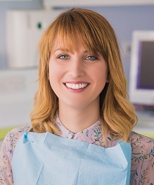 Smiling woman in dental chair