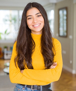 person standing in their living room 