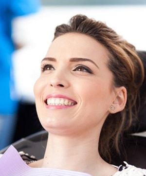 woman smiling in dental chair