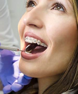 girl getting dental exam