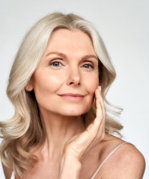 Closeup of mature woman smiling after BOTOX injections