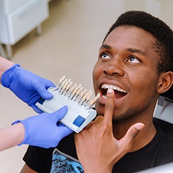 Dentist explaining cost of cosmetic dentistry in Jupiter to patient