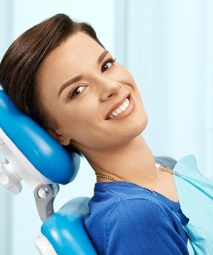 A woman visiting a Jupiter implant dentist
