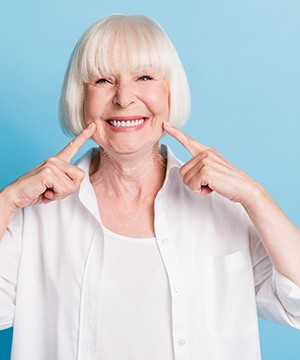 Woman smiling with dentures