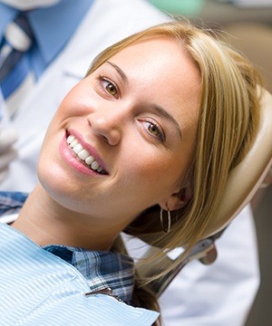 Smiling woman in dental chair