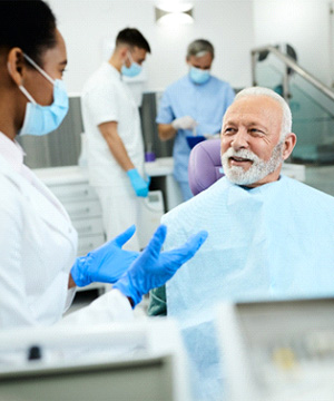 Man smiling after a root canal in Jupiter