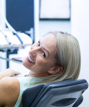 Woman after root canal in Jupiter