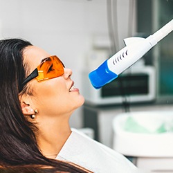 A woman receiving in-office teeth whitening