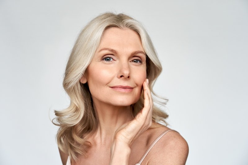 Closeup of woman smiling after BOTOX treatment