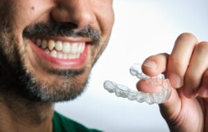 Man using SureSmile to correct his bite problems
